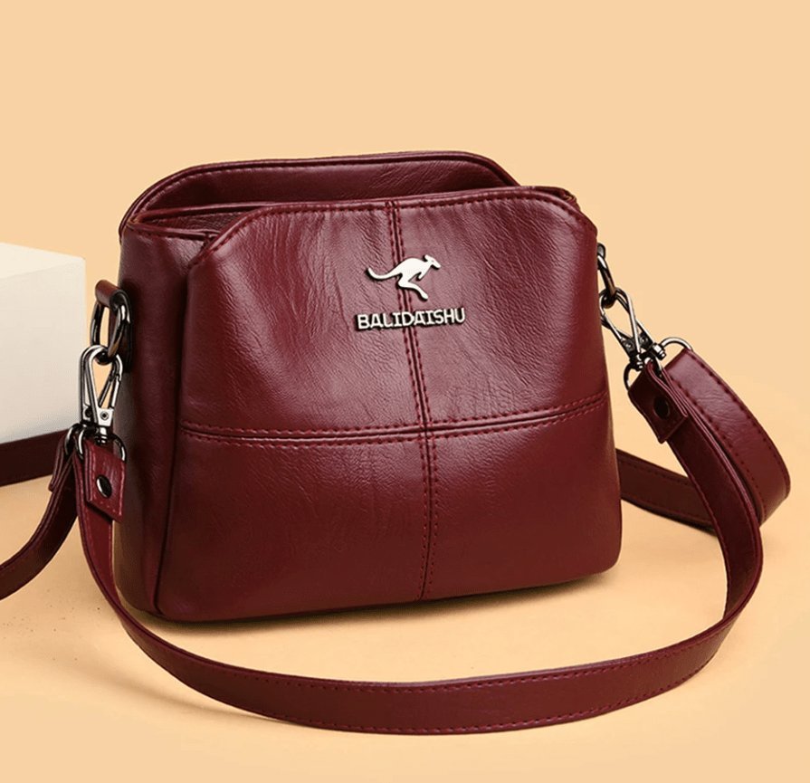 Women's Faux Leather Paneled Zip-Top Adjustable Crossbody Bag - Red